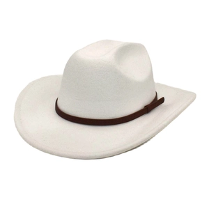 Detailed close-up of a white felt cowboy hat with a brown decorative leather band