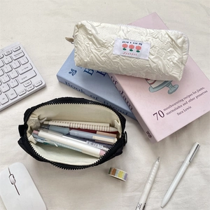 Large capacity aesthetic embossed pencil case for students featuring organized storage