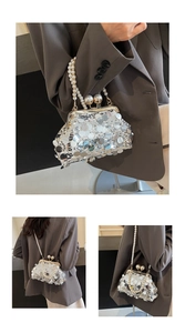 Detailed view of shimmering silver sequin evening bag with elegant white pearl handle