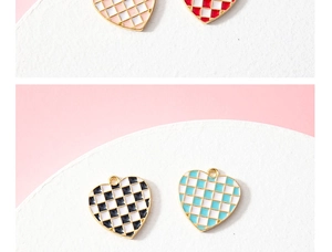 Detail showing heart-shaped checkerboard enamel charms in four vibrant colors