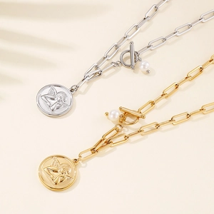 Gold and silver angel coin necklaces with paperclip chains and pearl T-bar toggles