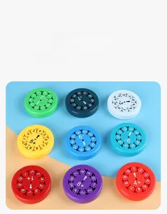 Detail view of 9 colorful math fidget spinners showing numbers and arithmetic symbols