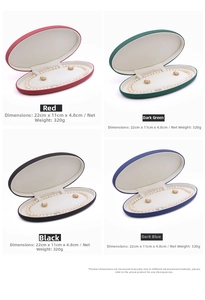 Detailed view of oval faux leather jewelry box with 22x11x4.8cm internal dimensions