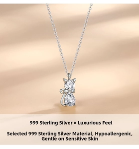 Macro shot of 999 silver cat necklace with sparkling zircon and hypoallergenic chain
