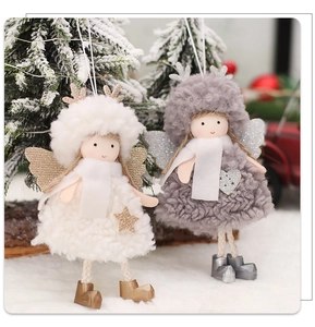 Detailed view of plush angel ornaments with glittering wings and reindeer antlers for Christmas