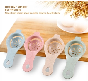 Macro view of wheat straw egg separators in pastel blue, pink, beige and green colors