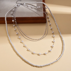 Exaggerated multi-layer faux pearl necklace with silver chain in vintage baroque style