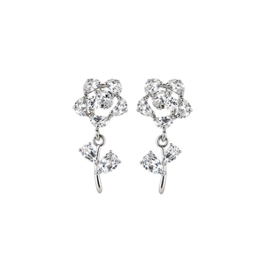 Silver flower drop earrings with clear zircon stones and leaf design on white background