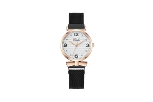 Close-up of rose gold watch face with white textured dial and black mesh strap