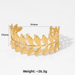 Detailed view of golden laurel leaf open bangle with size markings and vein texture