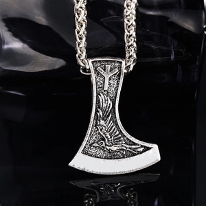 Detailed close-up of a Viking battle axe pendant with Nordic runes and silver eagle motif