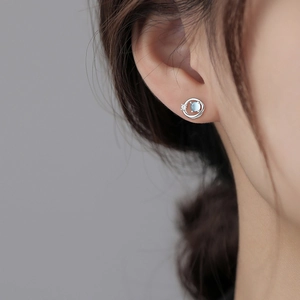 Minimalist silver Saturn earrings with light blue glass stone and zircon for women