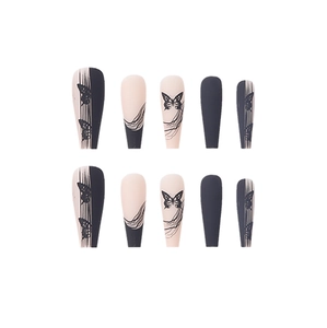 Long coffin ballet nails with black butterfly patterns and abstract line textures