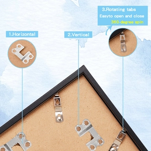 Detail of metal sawtooth hooks and 360-degree rotating tabs on black picture frame back