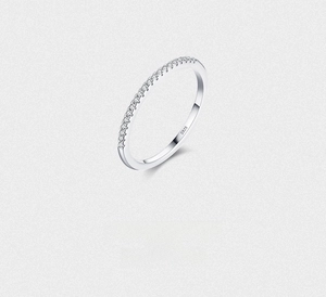 Close-up of S925 sterling silver ring with small clear zircons and hallmark engraving