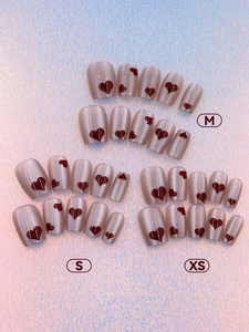 Detailed size guide for cat-eye nail press-ons featuring red hearts in XS, S, and M