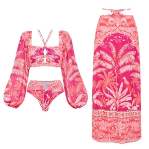 Three-piece tropical pink bikini set with long sleeve cover-up and matching maxi skirt