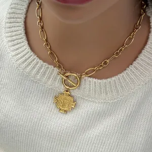 Chunky OT buckle 18k gold plated titanium steel necklace with cross pendant on model