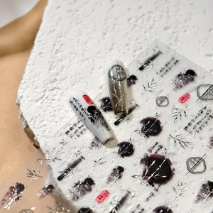 Ink style nail stickers with silver foil bamboo patterns and traditional art