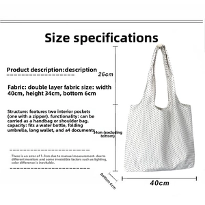 Detail showing the internal structure and large capacity of the polka dot canvas tote bag