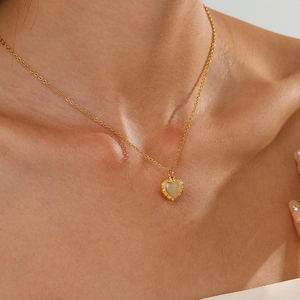 Minimalist 14K gold plated heart necklace with translucent opal stone on model