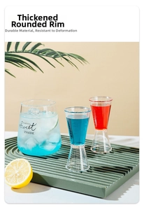 Close-up of double-headed cocktail jigger with clear measuring scales and colorful liquid