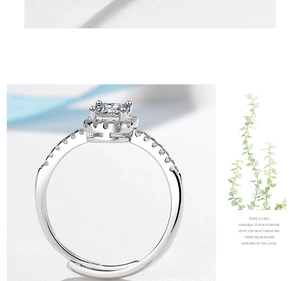 Detail of adjustable silver ring with square-cut halo cubic zirconia and pavé side stones
