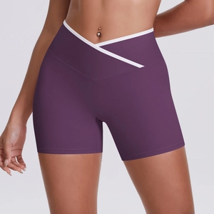 High-waisted yoga shorts in deep purple with white V-shaped crossover waist design