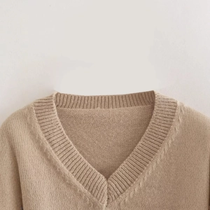 Elegant khaki V-neck knit sweater with thick ribbed collar and textured fabric detail