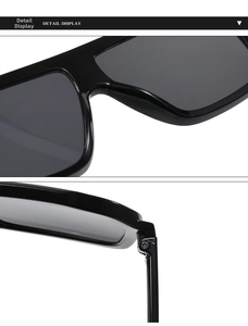 Detail of black sunglasses showing integrated nose pads and durable hinge construction