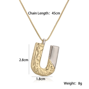Detail view of two-tone letter U pendant necklace showing 45cm chain length and dimensions