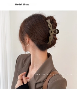 Modern olive green matte hair claw clip shown on a model's hair in a stylish updo style
