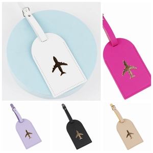 Waterproof leather luggage tags in multiple colors with golden airplane icons and buckles