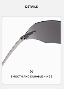 Detail shot of silver metal hinges and grey lenses on rimless fashion sunglasses
