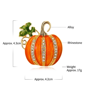 Halloween pumpkin brooch with orange enamel and sparkling rhinestones on gold alloy base