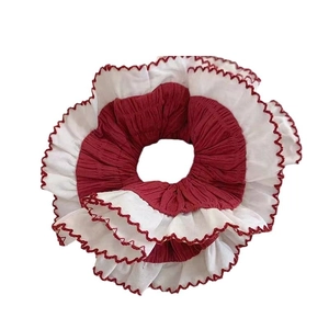 Elegant red and white layered lace scrunchie with chic ruffled chiffon design
