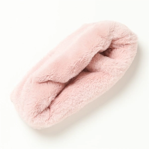 Close-up of soft pink faux rabbit fur neck warmer with plush texture on white background