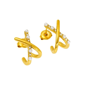 Detail of gold-plated X-shape earrings featuring sparkling crystal and white pearls