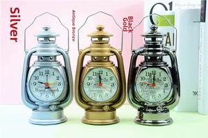 Vintage lantern-style desk clocks in silver, bronze, and gunmetal with Paris dial art