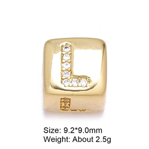 Macro detail of gold micro-pave cubic zirconia letter L charm bead for DIY jewelry