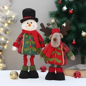 Charming plush Christmas snowman and reindeer figurines with red and green knit patterns