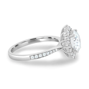 Side view detail of a silver engagement ring with a large princess cut central zircon