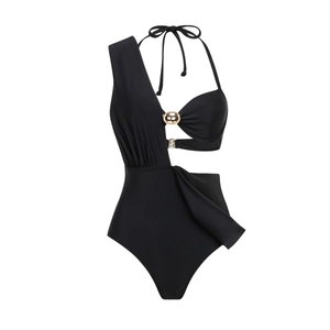 Detail of black one-shoulder swimsuit with gold metal ring and waist cut-out
