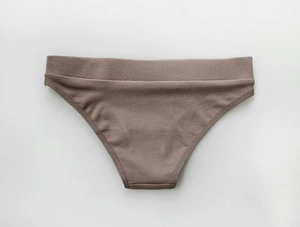 Detailed close-up showing the ribbed texture of brown cotton low-waist sports panties