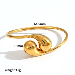 Polished hollow teardrop stainless steel open bangle in gold finish with measurements