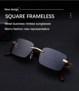 Detail of rimless square sunglasses with dark wood grain temples and gold metal accents