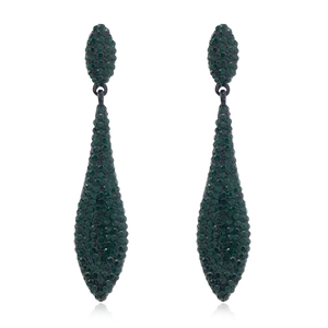 Detail of luxury teardrop earrings with dark green crystal pavé and black metal base