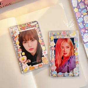 Close-up of decorative DIY photocard holders with cute cartoon stickers and icons