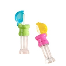 Close-up of baby straw cups in blue green and pink yellow with flip-top lids and transparent body