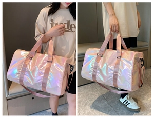Pink gradient travel bag with side shoe compartment and adjustable shoulder straps
